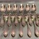 Suite of 12 small silver metal spoons in Louis XV style