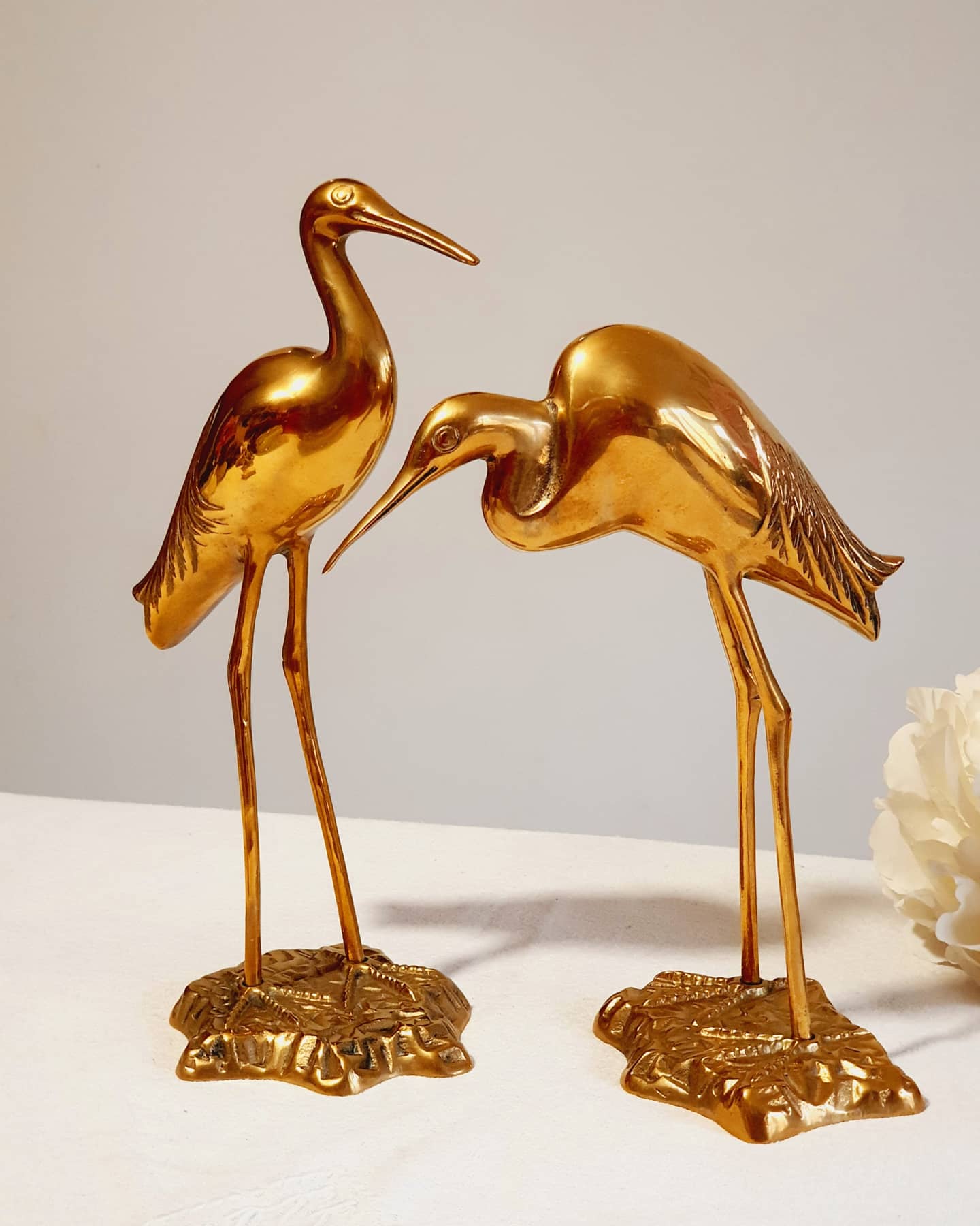 Couple of heron in vintage golden brass