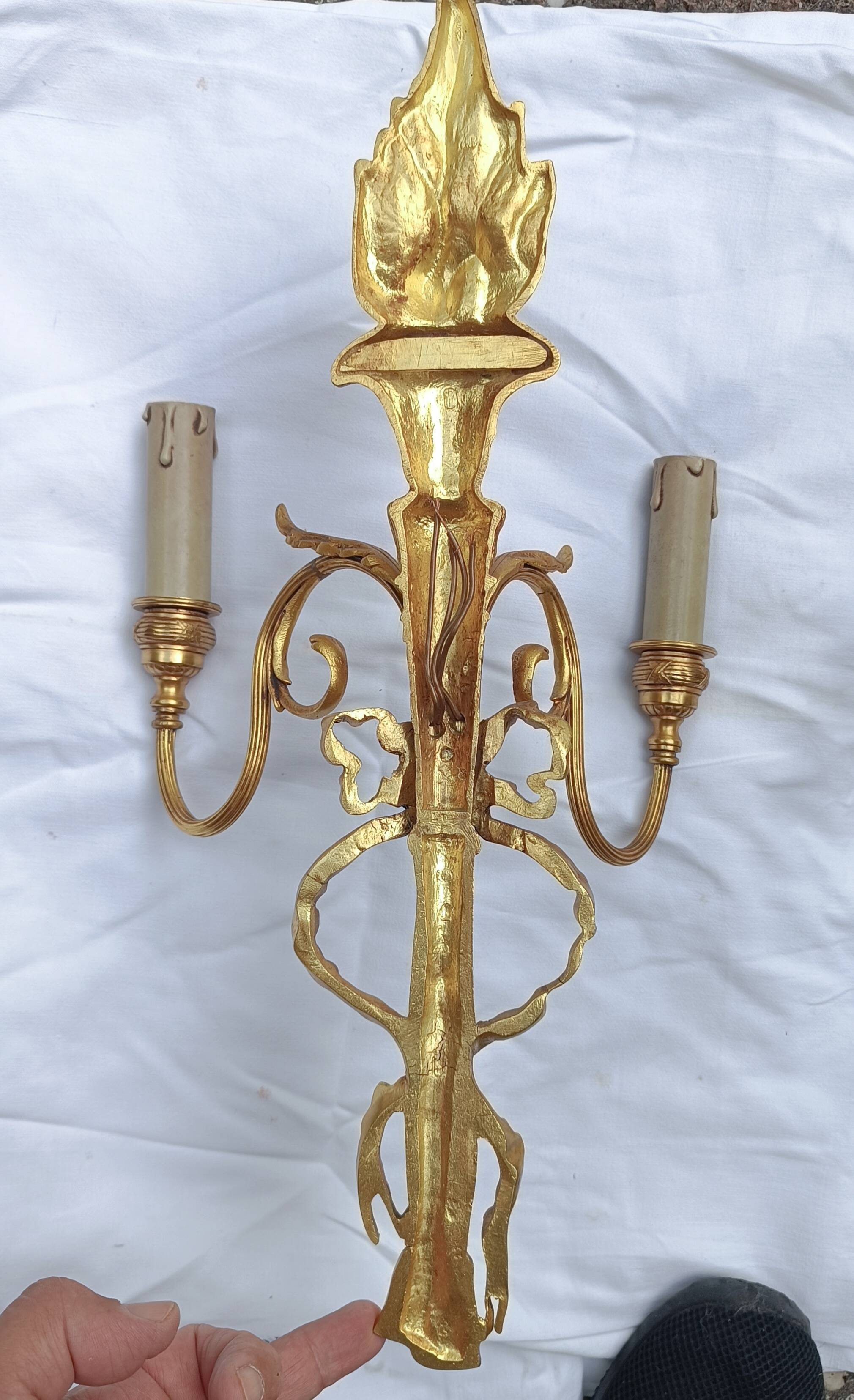 Pair of "torch" wall sconces Louis XVI in gilded bronze