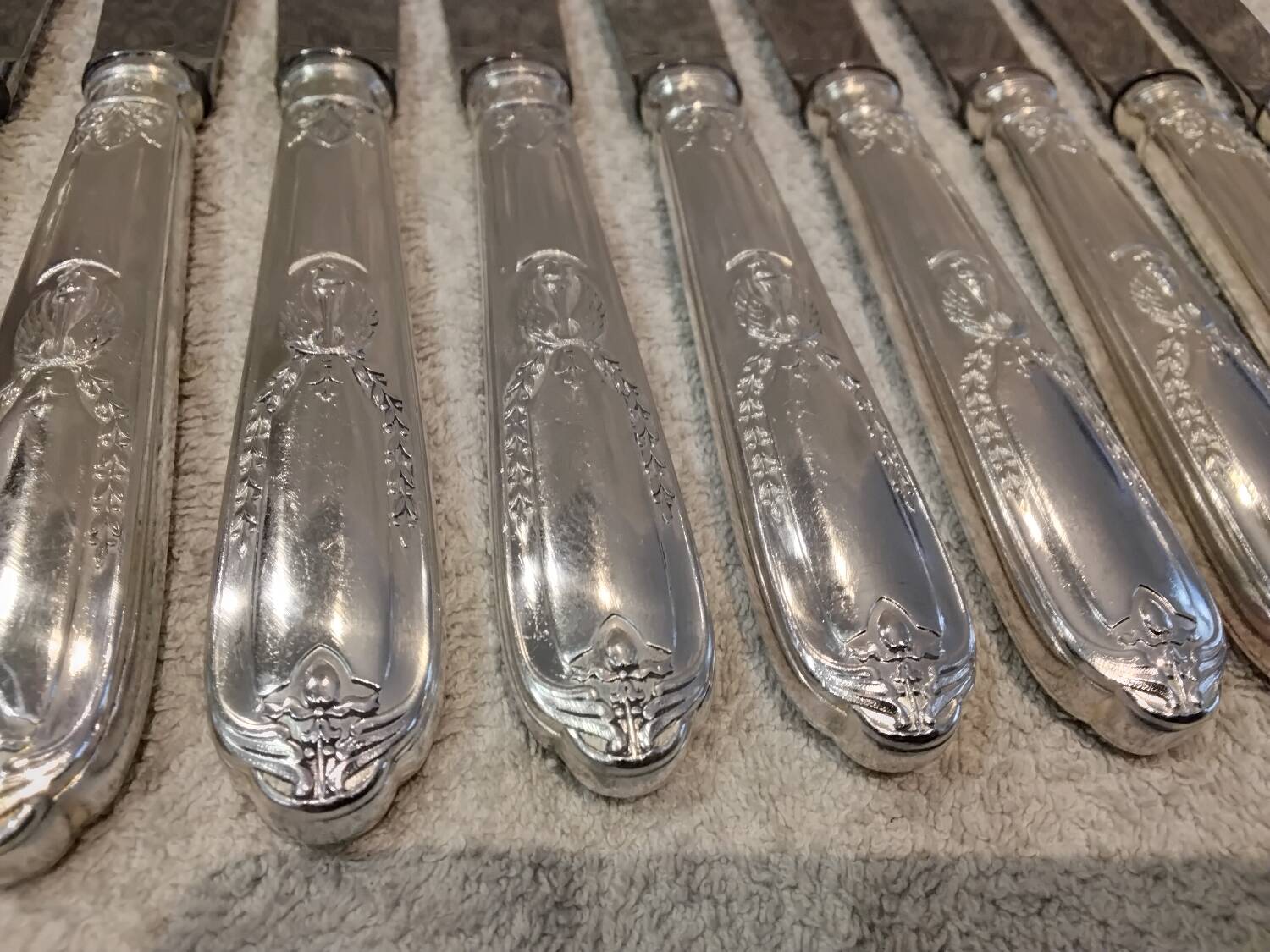12 silver-plated metal table knives by the silversmith Ravinet Denfert, Empire style, model 81.