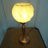 Candlestick lamp with globe