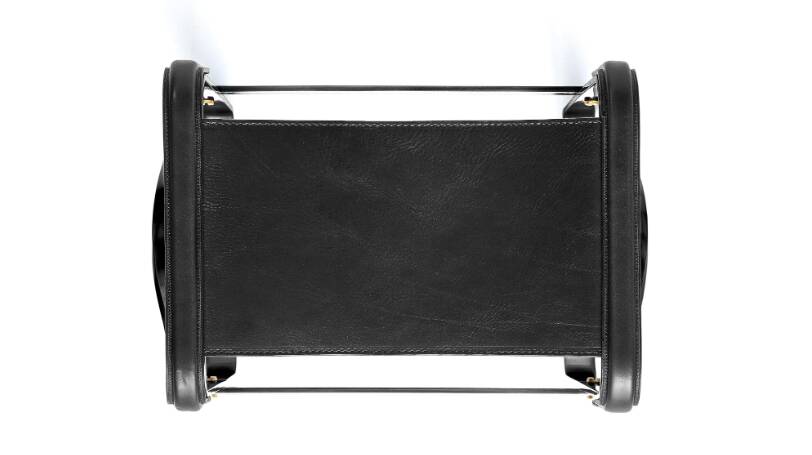 Black smoked steel and black leather footrest, contemporary style.