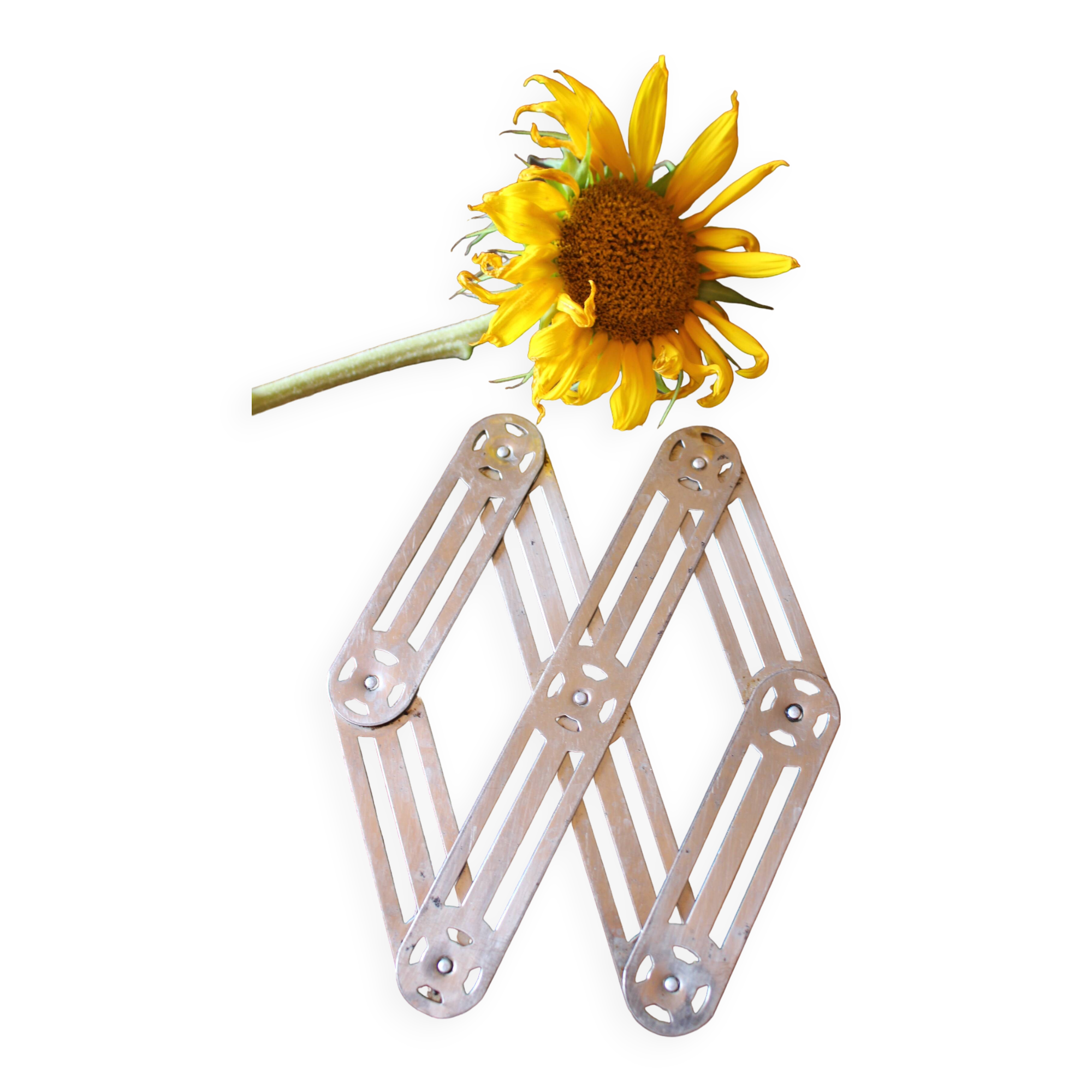 Vintage accordion folding metal trivet