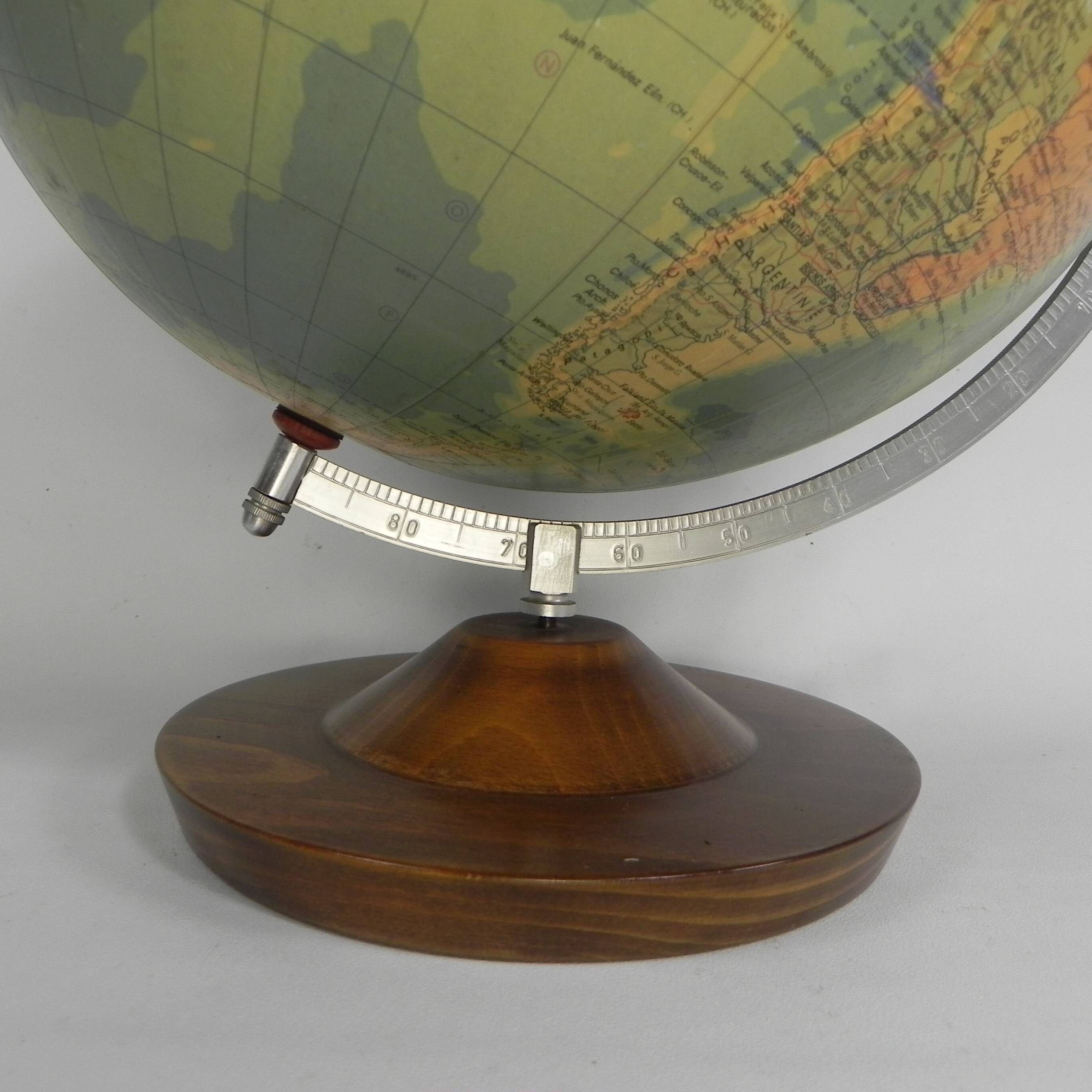 Paper mache globe on a wooden base, 1975
