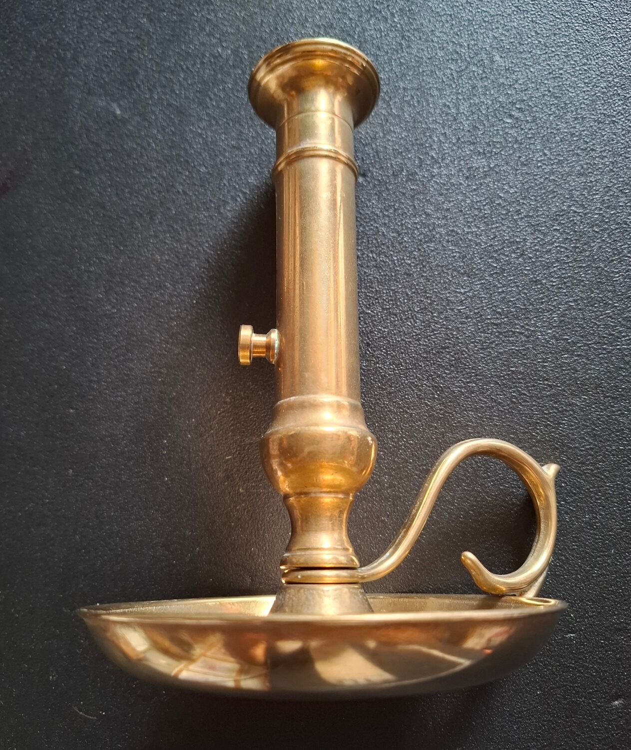 Vintage candlestick in solid bronze