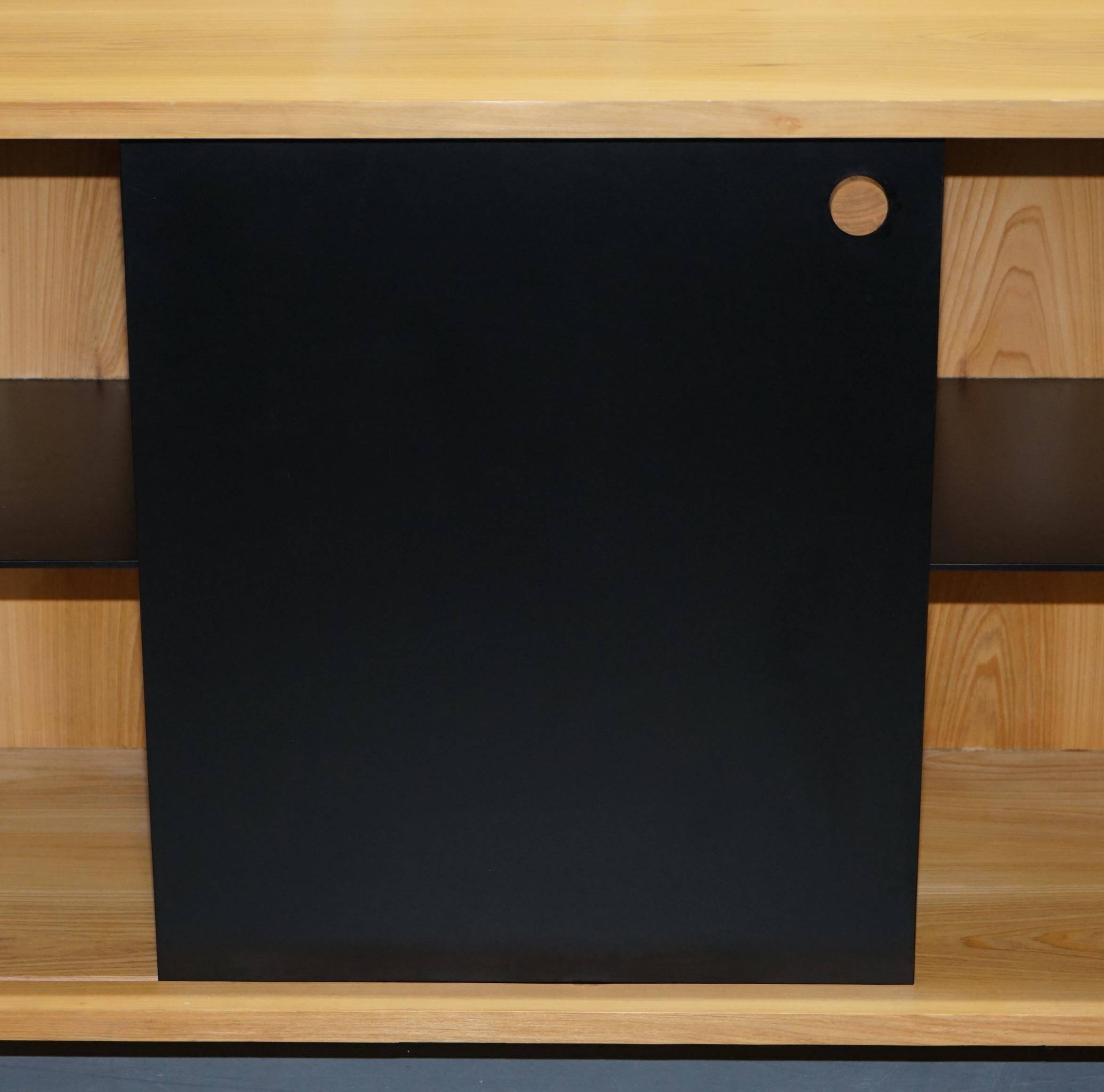 Buffet Ralph Lauren with polished slate stone and rosewood shelves.