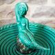 Ceramic cup with mermaid decoration