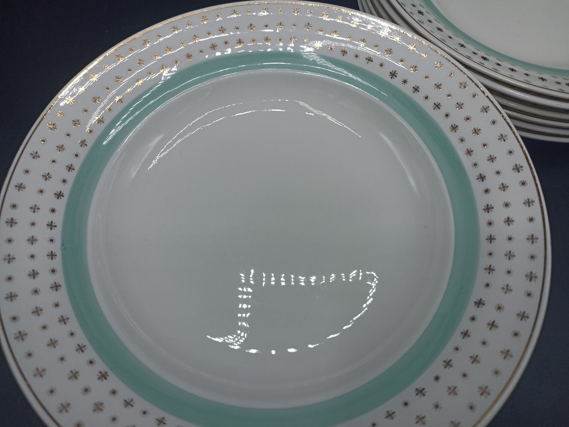 12 hollow porcelain plates - Stars and mint green
