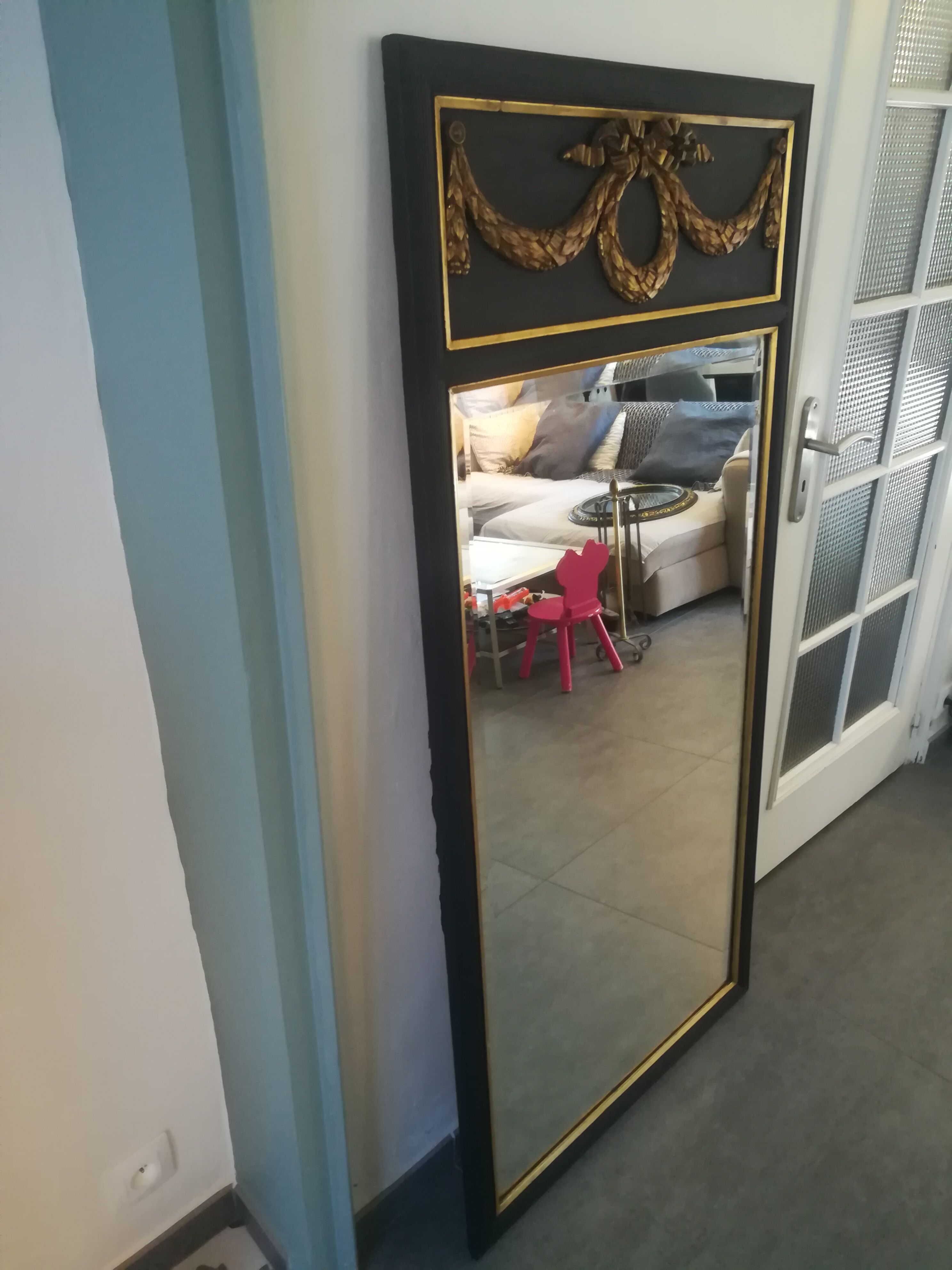 Trumeau louis XVI style mirror in black and gold stucco