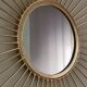Miroir soleil métal doré