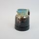 Art Deco pitcher in black, brown and blue glazed ceramic