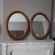 Paire de miroirs anciens ovales