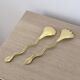 Gold metal snake salad serving set
