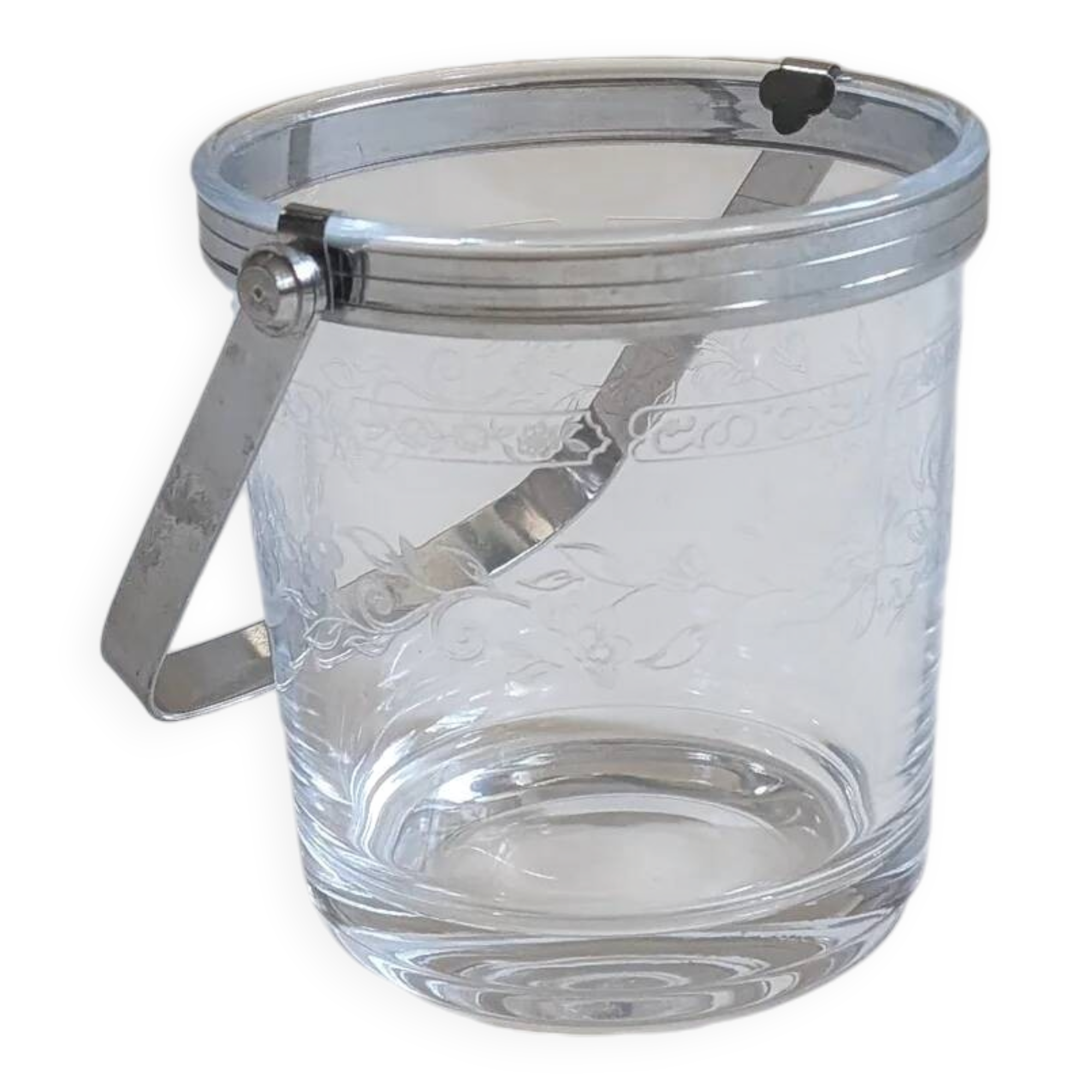 Clear glass ice bucket with an etched floral design