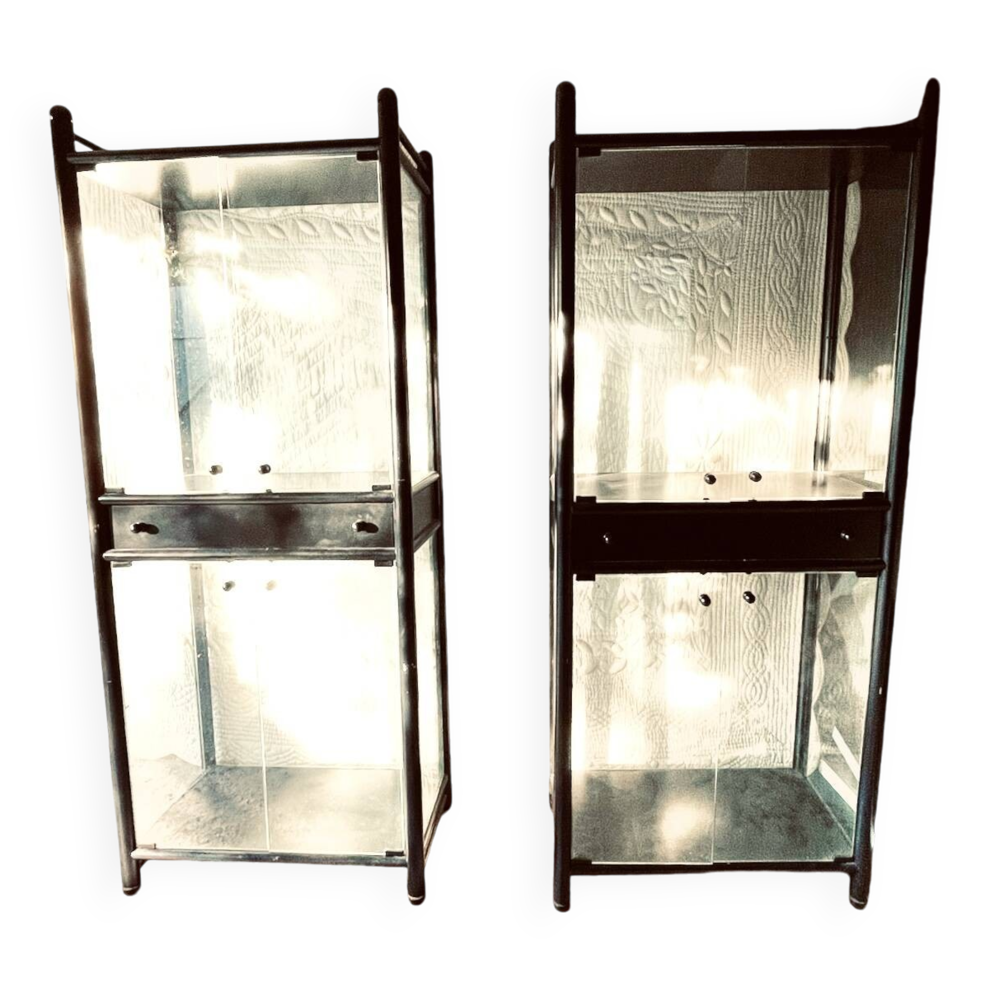 2 display cabinets signed by Baumann