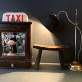 Antique milking stool in rustic curved wood, 19th century