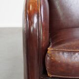 Subtle sheep leather armchair with a beautiful finish and a good patina