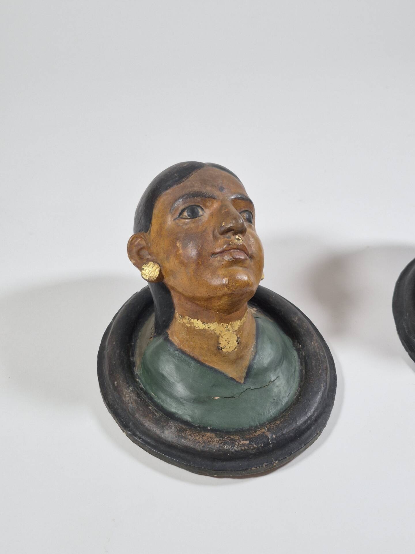 Pair of antique ceramic portrait busts from Rajasthan