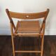 2 folding wooden chairs