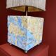 Base stuck blue beige marble-plaster, fringed lampshade Houles, 21st century.