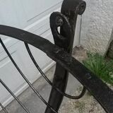 Former cradle in wrought iron