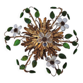 Flower wall light, gilded metal and glass cabochons, attributed to Baguès.