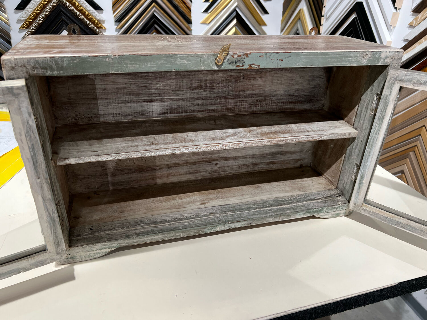 Small teak wall shelf