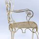 Pair of wrought iron and gilded armchairs, circa 1990