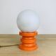 Lampe space age bois orange et globe opaline, années 70