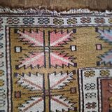 Handmade rectangular oriental rug dating from the 1960s in 100% wool
