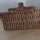 Rattan basket with logs