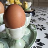 Vintage serving tray and its 6 egg cups.