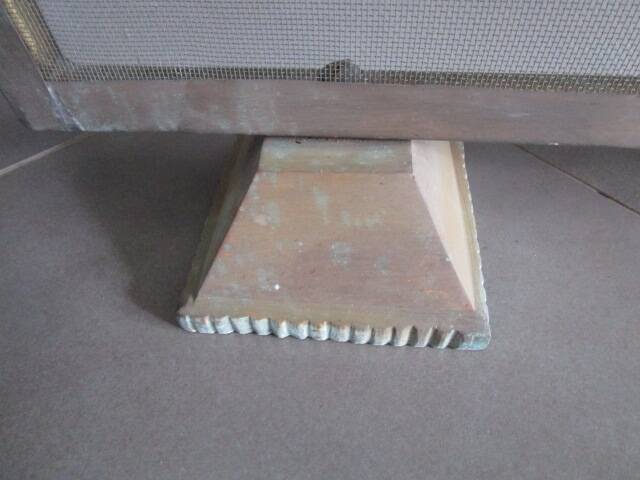 Antique gold metal firewall