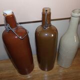 Lot of 3 bottles of varnished sandstone