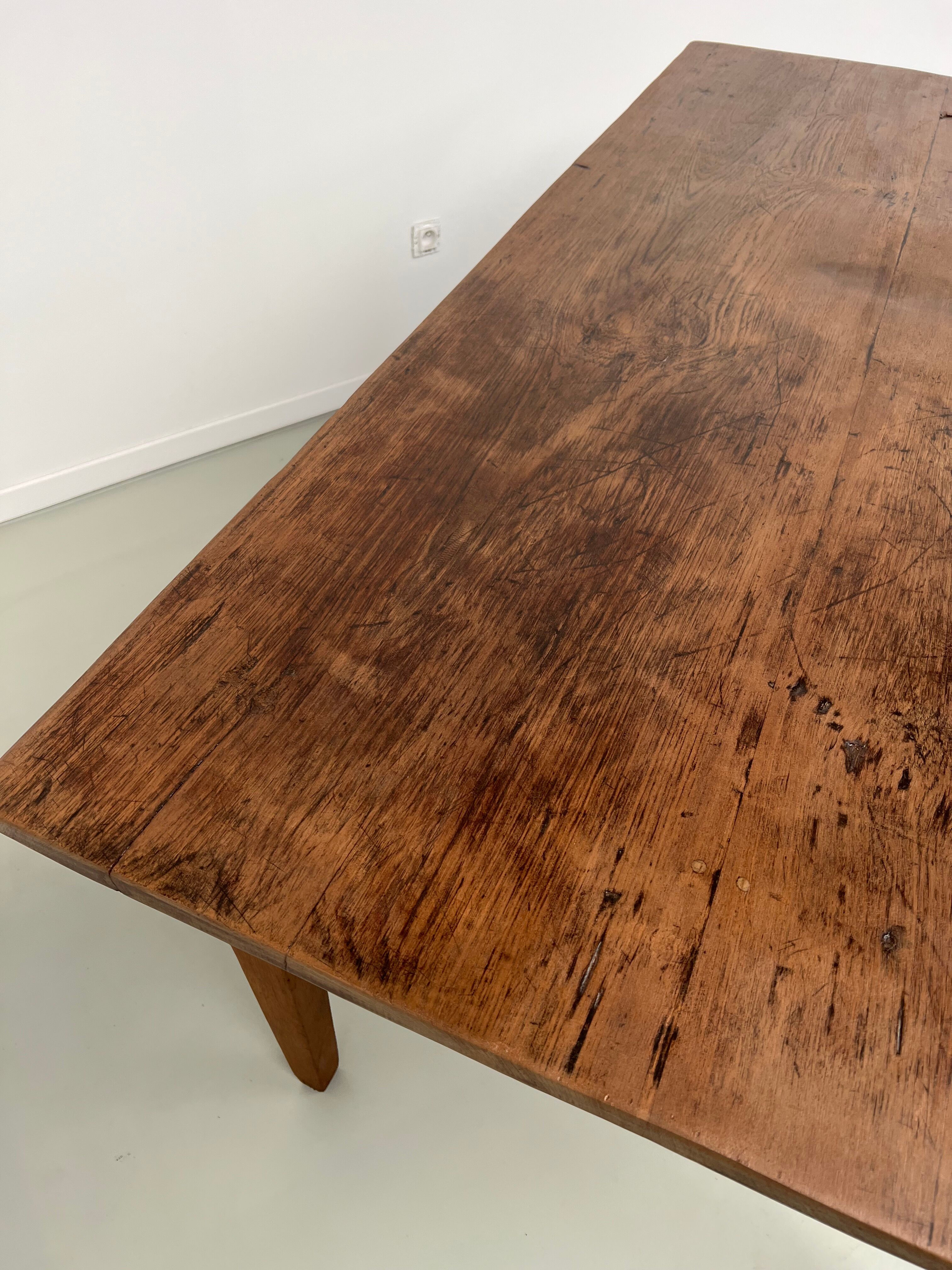 Teak dining table with spindle legs, 50s