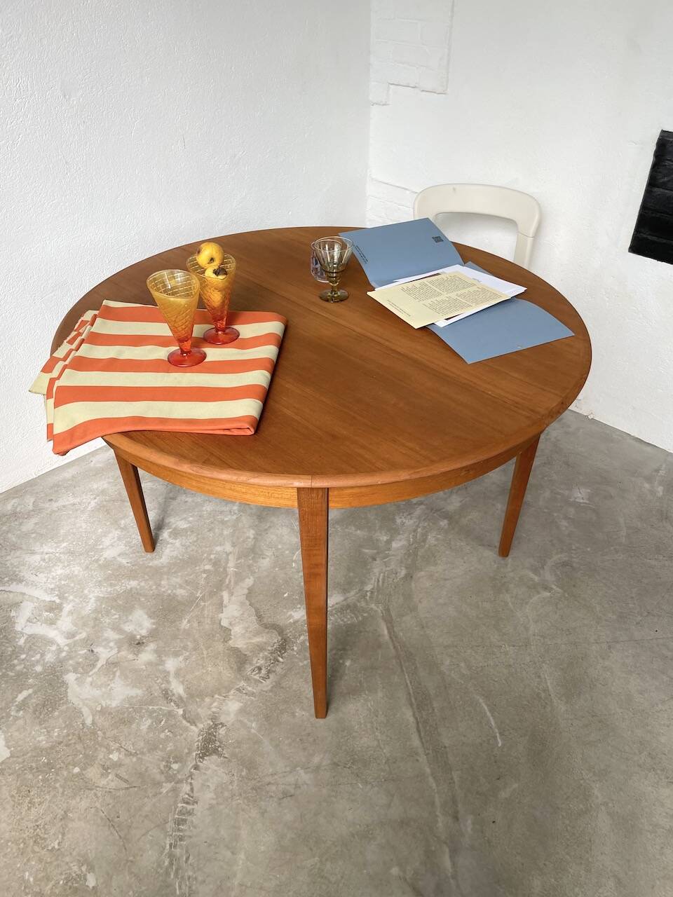 Scandinavian round teak table with extension