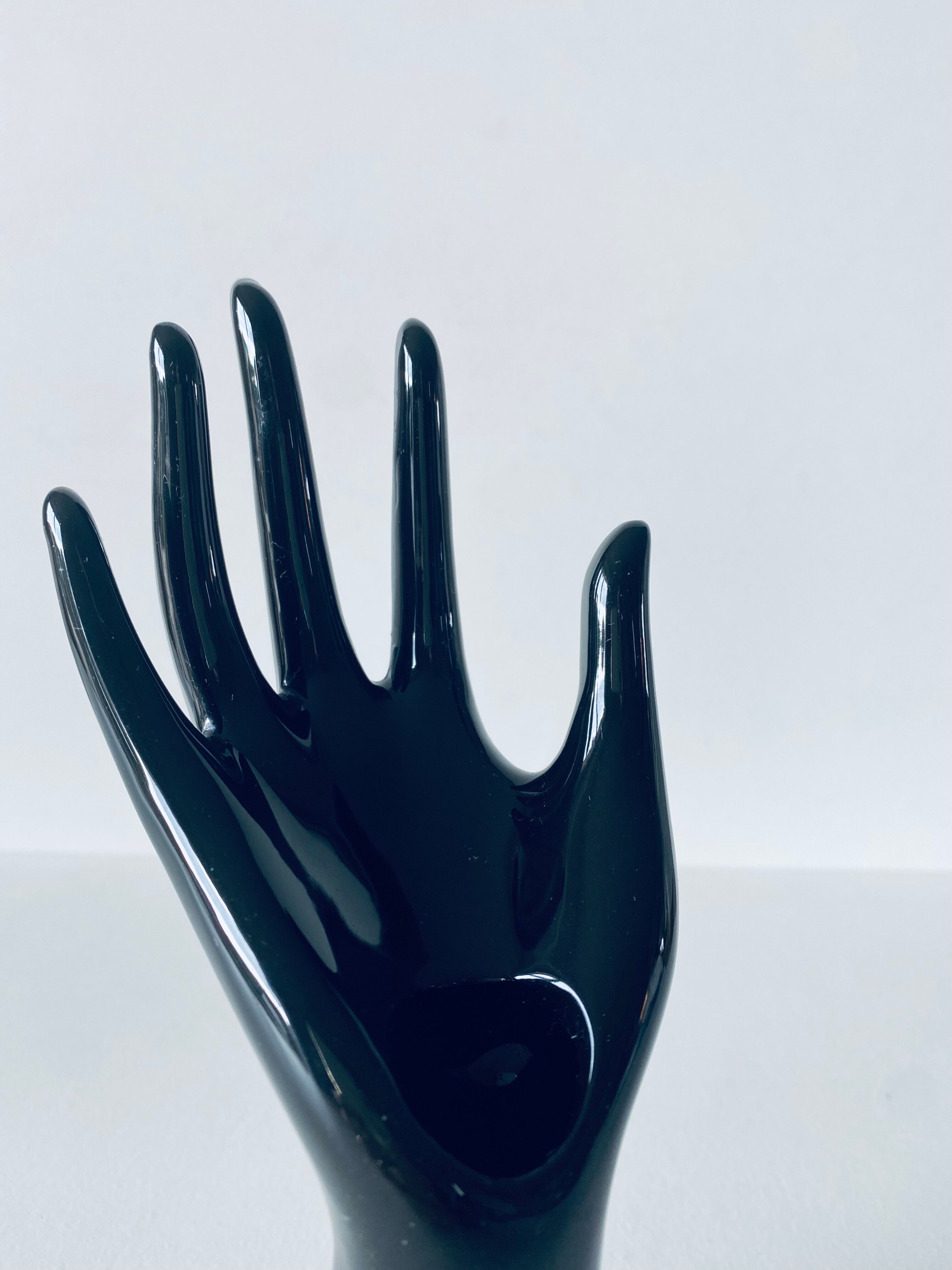 Hand vase and ceramic jewelry holder