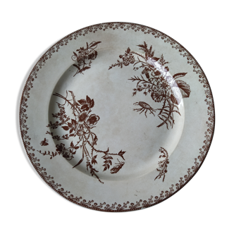 Plat ancien rond avec fleurs