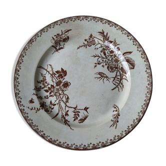 Old round dish with flowers