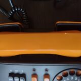 Vintage orange telic phone with ptt dial