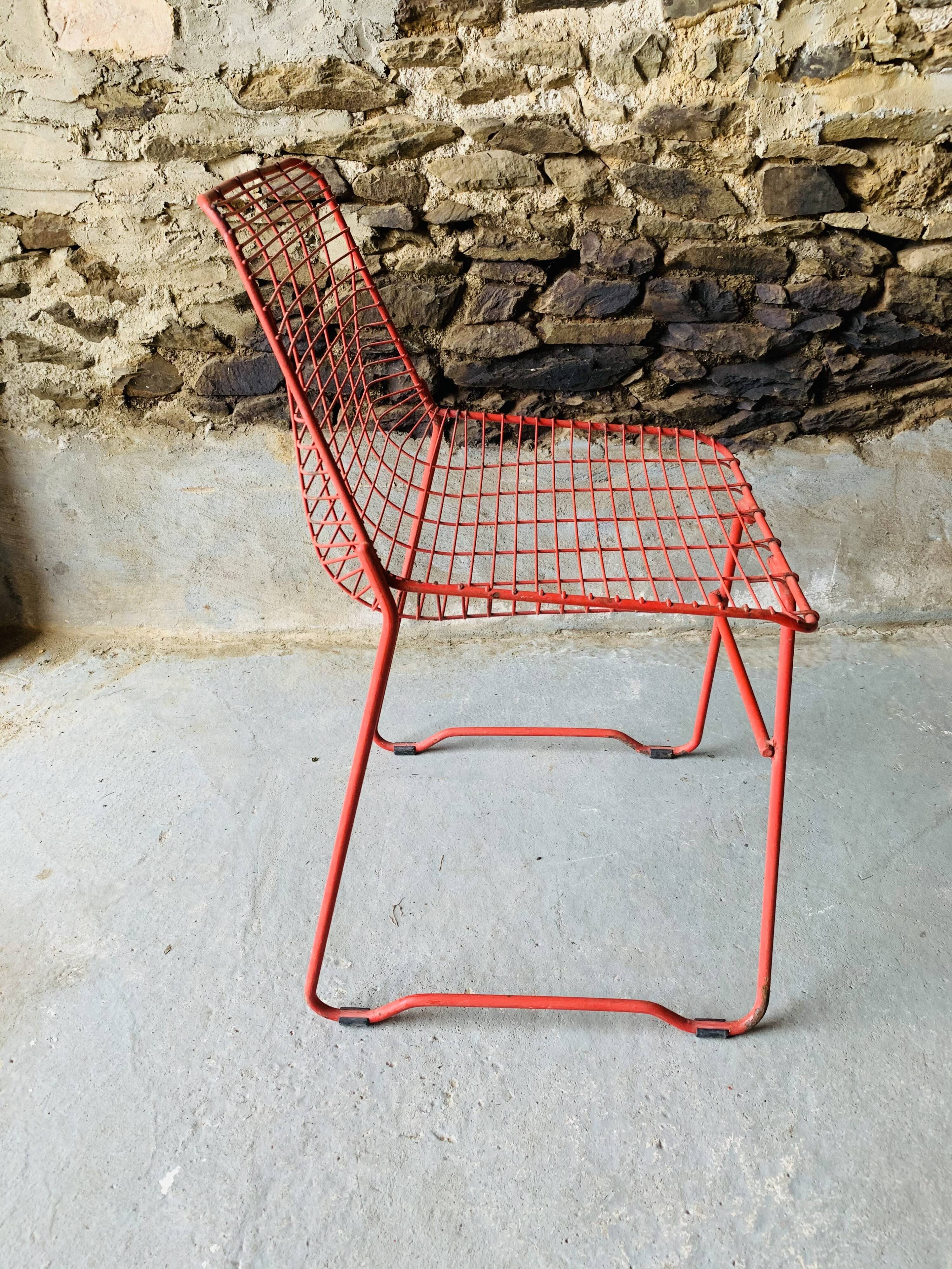 4 red design chairs