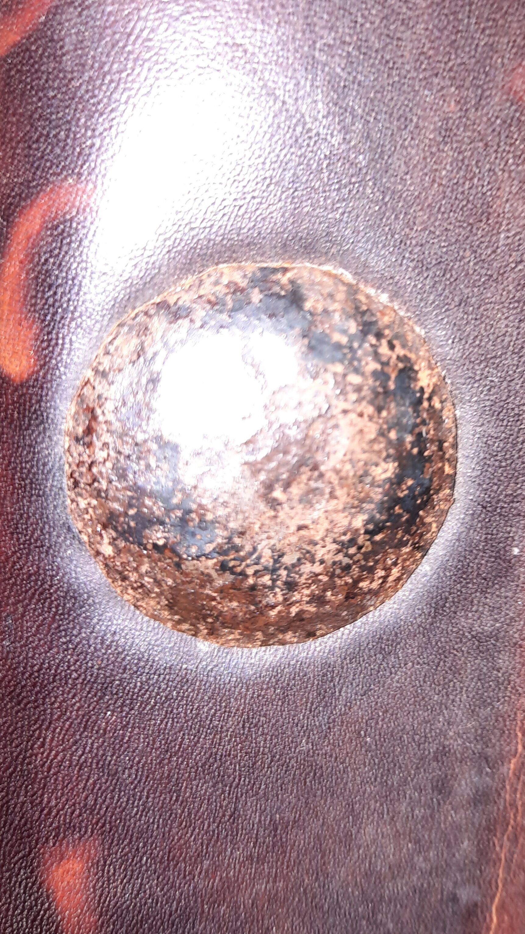 Pair of medieval leather style armchairs