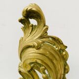 Louis XV style chiseled bronze firedog, 20th century