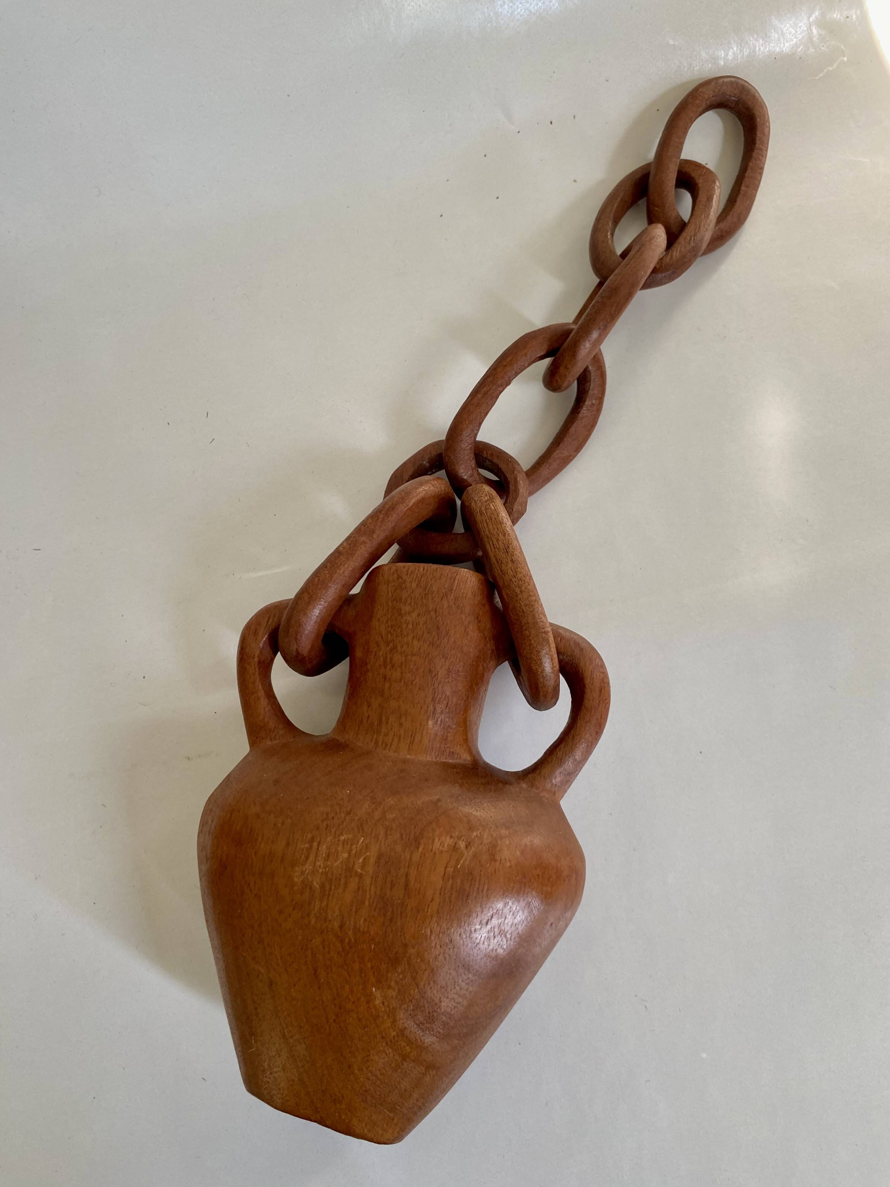 Vase and wooden chain to hang