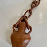 Vase and wooden chain to hang