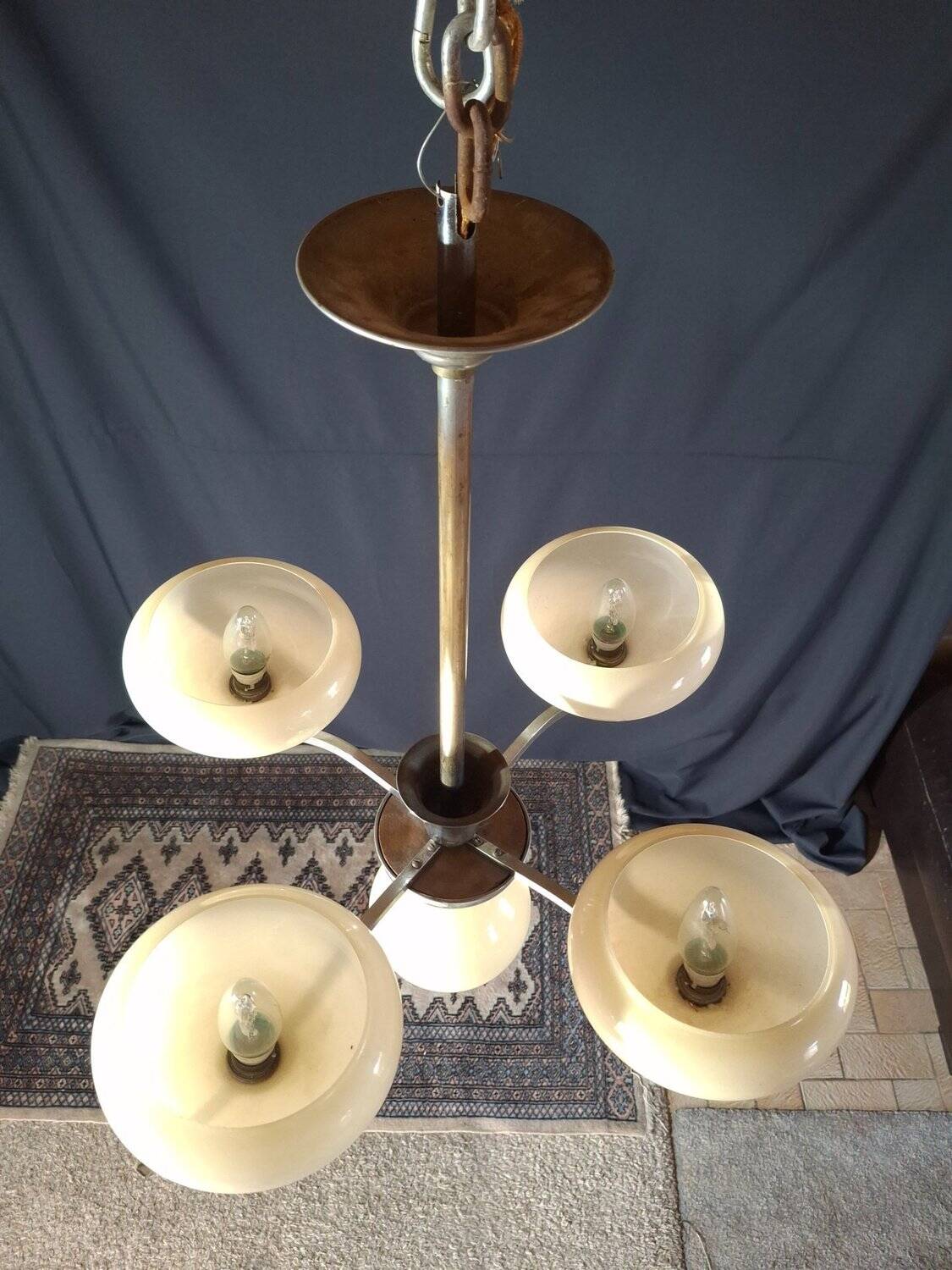 Chrome metal chandelier with 5 pale yellow opal shades from the 1950s.