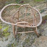 Rattan armchair with armrest