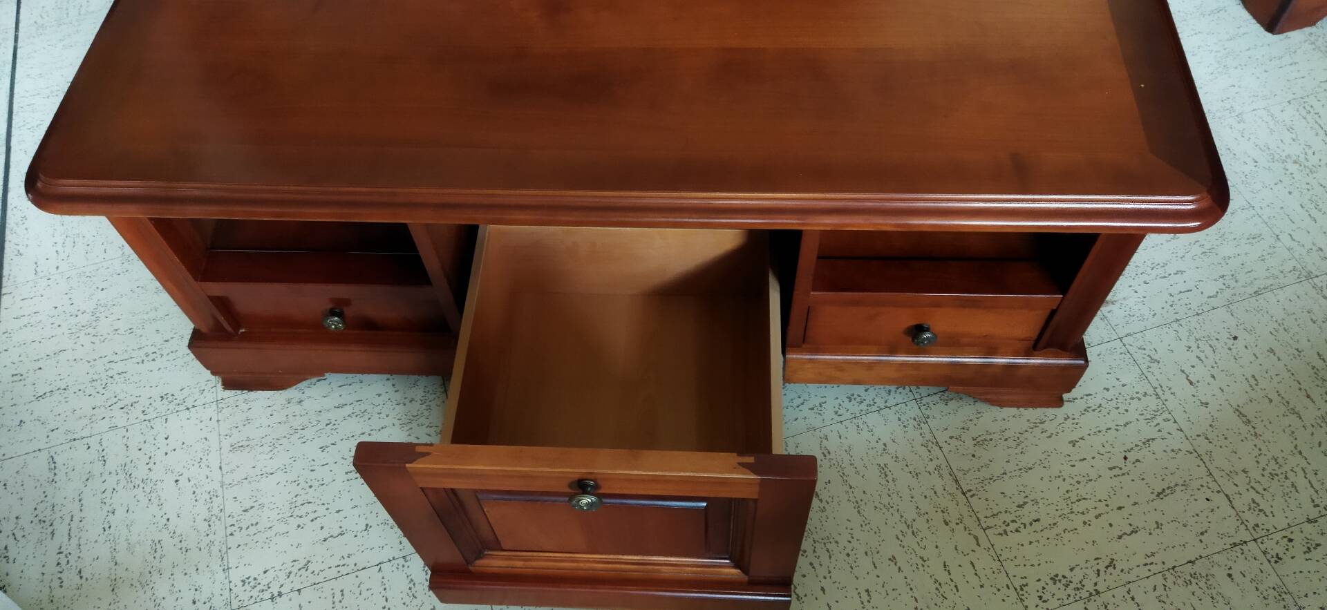 Louis Philippe style coffee table in cherry wood with large drawers.