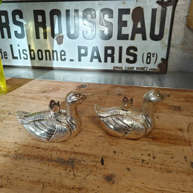 Set of two antique silver-plated candlesticks.