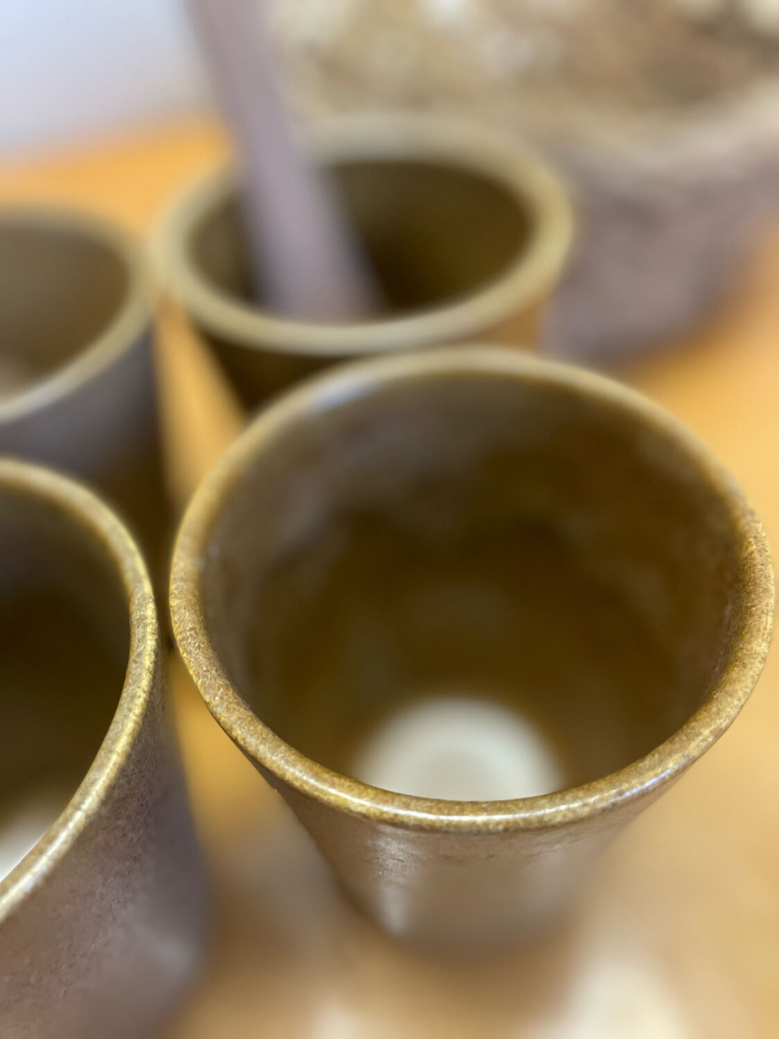 Set of 4 Digoin stoneware cups, glasses and wooden spoons